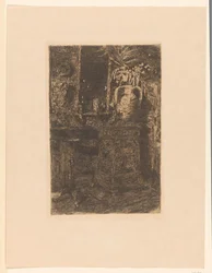 Interno di atelier con stufa, camino e vaso di fiori