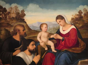 La Sacra Famiglia con un donatore in un paesaggio