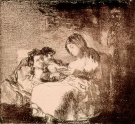 Una donna legge una storia a due bambini