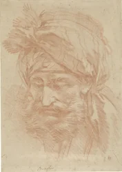 Testa di un orientale barbuto con turbante, vista frontale, con lo sguardo rivolto verso il basso