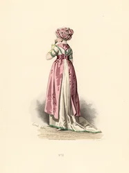 Donna in abito bianco e corsetto con rifiniture verdi, grembiule rosa