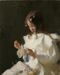 Ritratto di un bambino che cuce