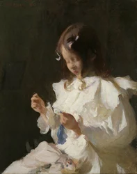 Ritratto di un bambino che cuce