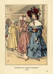 Donne alla moda a uno spettacolo, Parigi. Donna con grande cappello con nastri, vestito con colletto alto, mantella di pizzo o pelerine e maniche ampie en beret. Entrando alla Comedie Francaise