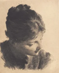 Giovane ragazza di profilo, che guarda in basso