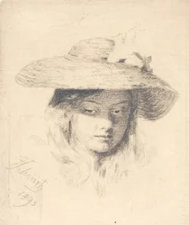 Giovane ragazza con cappello di paglia