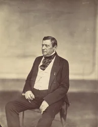 [Uomo seduto in gilet bianco e cappotto scuro], 1850-60