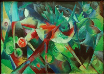 Cervo nel giardino fiorito