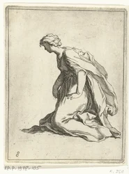Giovane donna inginocchiata