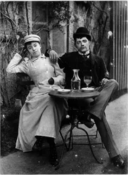 Coppia sulla terrazza di un caffè che beve assenzio - fotografia, circa 1890