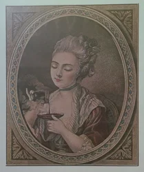 Una signora che beve cioccolata