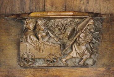 Intaglio raffigurante una coppia in un carro trainato da un uomo, da uno stallo del coro (legno)