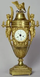 Vaso con orologio e aquila