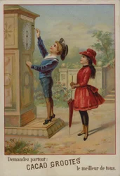 Ragazza che guarda un ragazzo regolare un orologio