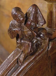 Musicista che suona un doppio flauto, dettaglio da un coro, XIV-XVI secolo (legno)