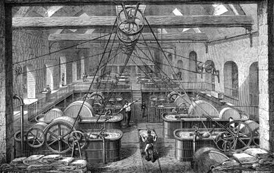 Industria della carta: laboratorio per la raffinazione e lo sbiancamento della pasta di carta. Incisione 1867
