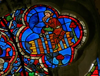 Finestra Ew raffigurante i Lavori dei Mesi: Ottobre