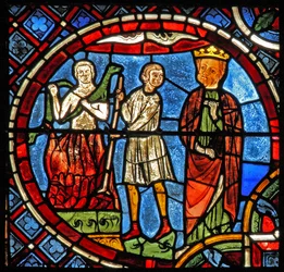 serpente morde un uomo avvolto dalle fiamme