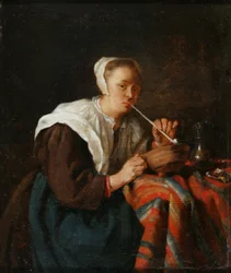 Una Donna Seduta che Fuma una Pipa