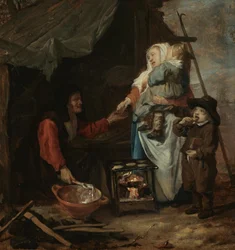 Una donna anziana che vende frittelle