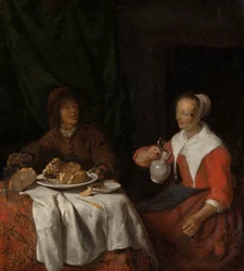 Uomo e donna a un pasto