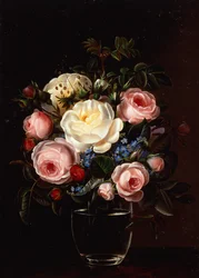 Peonie in un vaso su un tavolo