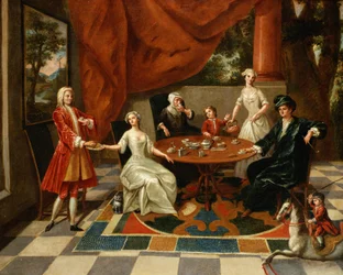 Una famiglia elegante che prende il tè