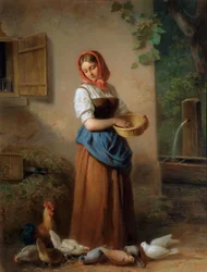 Una ragazza che nutre galline e piccioni