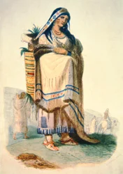 Madre Sioux con bambino in una culla