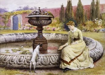 Una signora e un cane accanto a una piscina ornamentale