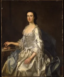 Mary, moglie di Henry, 7° Lord Arundell di Wardour, in un vestito di raso grigio, con rose su un tavolo
