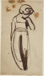 Bambino in piedi con la mano sul mento