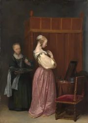 Una giovane donna ha la sua toilette