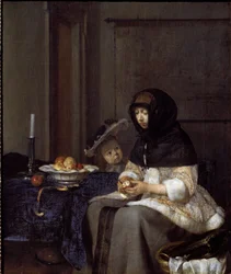 Una madre che sbuccia una mela