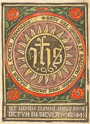 Monogramma JHS in un cerchio fiammeggiante