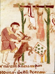 Un macellaio affetta una capra (miniatura, IX secolo)