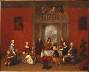 Ritratto di gruppo di una famiglia in un interno elegante