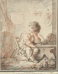 Bambino poeta al lavoro in un interno