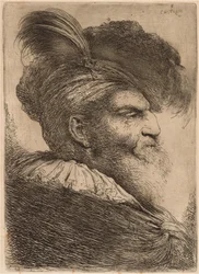 Uomo con lunga barba e copricapo, rivolto a destra