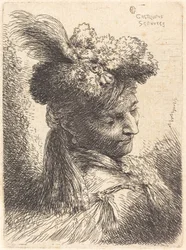 Giovane uomo con copricapo di pelliccia e fascia, rivolto a destra