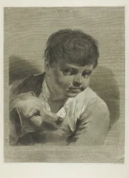 Un ragazzo con un cane