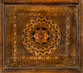 Coro canonico ligneo, intarsiato da Giovanni Maria Platina 1484, stallo inferiore