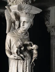 Dettaglio dei gruppi scolpiti che sostengono la Cattedra realizzata da Giovanni Pisano: la Chiesa che nutre i suoi figli (dettaglio)