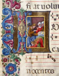 Lettera decorata raffigurante Maria Maddalena ai piedi di Gesù