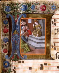 Lettera decorata raffigurante il Bambino Gesù e i Dottori
