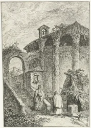 Veduta di case e rovine antiche ai margini della città