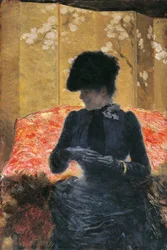 Donna sul divano rosso