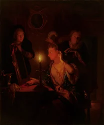 Signora allo specchio alla luce di una candela