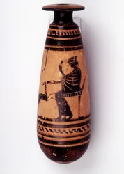 Pittura su vaso: alabastro usato per contenere il profumo: un lato raffigura una donna che gioca con un cerbiatto e tiene un fiore. Il suo cesto per la lana è dietro di lei. 500 a.C. BNF, Ufficio delle Medaglie