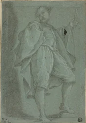 Uomo in piedi con bastone